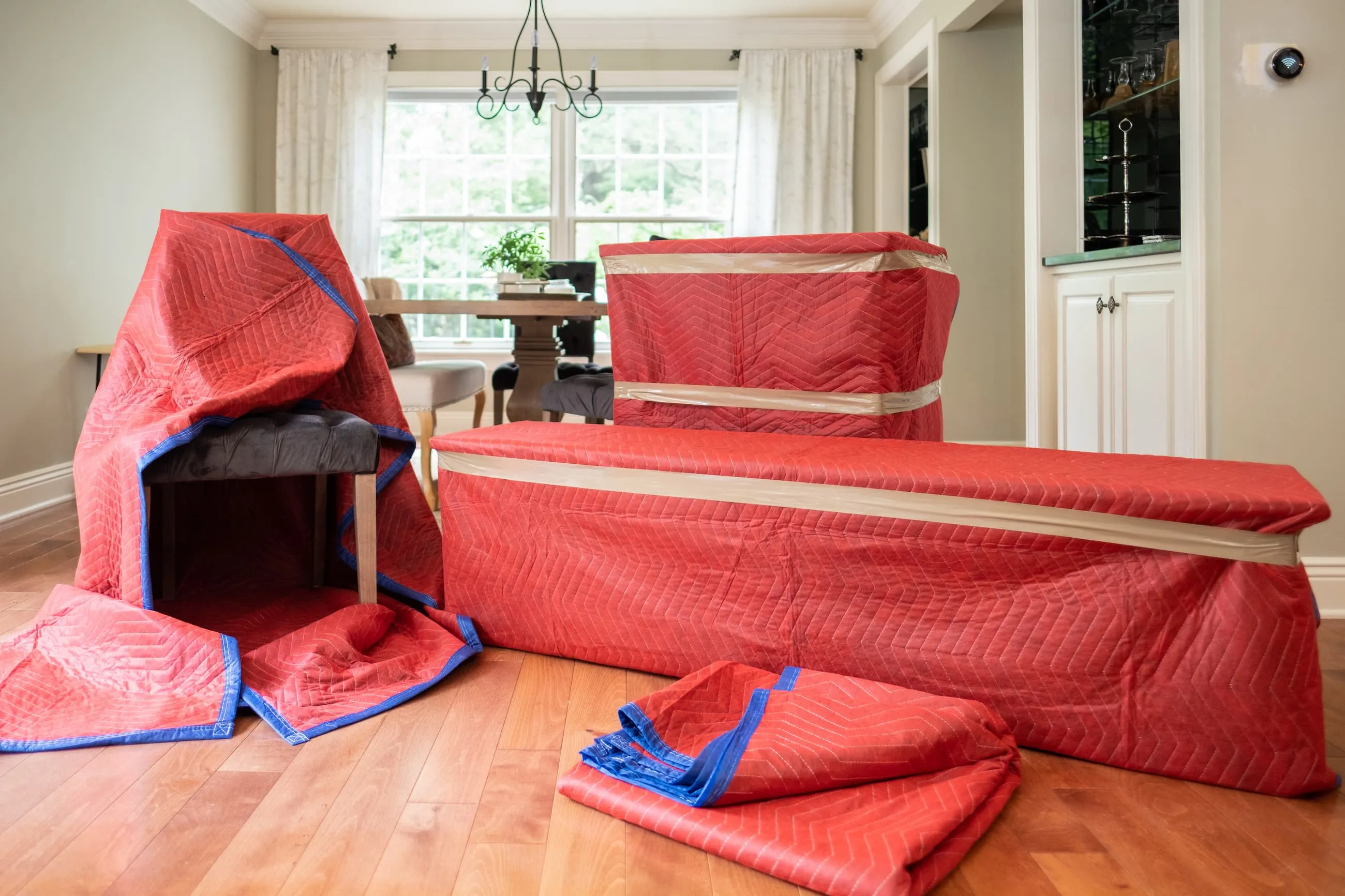 Folded protective moving blankets.
